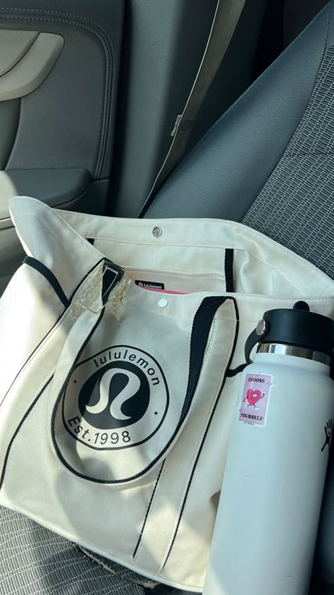 Tote bag
Lululemon 
School bag
Hydro flask 
Aesthetic Lulu Tote Bag, Lululemon Bag Aesthetic, Aesthetic Gym Bag, Luxurious Purses, Pilates Essentials, Lululemon Tote Bag, Gym Tote Bag, Lululemon Gifts, Camo Pants Outfit