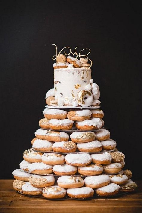 Gold and white donut stack with single tier wedding cake #wedding #weddings #weddingideas Donut Stack, Single Tier Wedding Cake, Doughnut Wedding Cake, Donut Bar Wedding, Donut Wedding Cake, Donut Wedding, Purple Wedding Inspiration, Wedding Cake Prices, Wedding Donuts