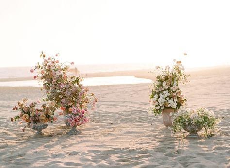 This sun-drenched, floral-filled dream has us craving a long vacay somewhere tropical and warm. If you're looking for wedding inspiration that is every bit romantic as it is beachy - then this one's f... Beach Wedding Flower Arrangements, Floral Beach Wedding, Beach Floral, Beach Wedding Ceremony Set Up, Beach Ceremony Florals, Whimsical Beach Wedding, October Beach Wedding, Beach Wedding Florals, Beach Wedding Arch Alternative