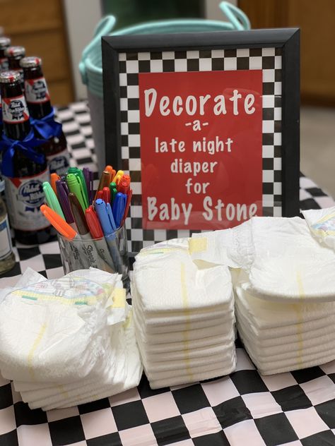 Decorating a diaper with some words of encouragement for the mom & dad to be, help but a smile on their face when they experience some not so fun baby bodily explosions 😂 Warped Tour Baby Shower Theme, Skateboard Baby Shower Ideas, Vans Baby Shower Theme, Baby Shower Motorcycle, Rock Baby Showers, Announcement Pictures, Racing Baby, Diaper Party, Classy Baby Shower