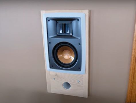 8 Ways How to Hide Large Speakers in Living Room - HomeProfy Tv Speakers Living Room Wall, Hiding Subwoofer In Living Room, Surround Speakers Living Room, Hiding Surround Sound Speakers, Rear Speakers Living Room, Bookshelf Speakers Living Rooms, Media Wall With Speakers, Built In Speakers Wall, How To Hide Surround Sound Speakers