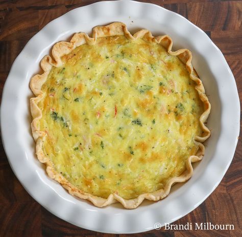 Calling all seafood lovers! Looking for a breakfast dish that's savory and quick? Make this Crab Quiche recipe for guests, Easter brunch, Mother's Day or any occasion you want to impress. This savory quiche recipe has perfect flavors of crab and cheese. Seafood Quiche Recipes, Crab Quiche Recipes, Seafood Quiche, Savory Quiche, Crab Quiche, Homemade Pie Crust Recipe, Refrigerated Pie Crust, Quiche Recipe, Homemade Pie Crusts