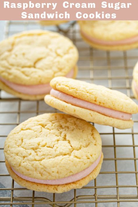 Soft sugar cookies are filled with sweet raspberry cream filling and then sandwiched together to create these light Raspberry Cream Sugar Sandwich Cookies! #Raspberry #Cookies #SandwichCookies #RaspberryCookies #CookieRecipes #RaspberryRecipes #SugarCookieSandwiches #RaspberryButtercream #CookieSandwiches Raspberry Cream Filling, Cookies Raspberry, Sandwich Cookies Filling, Fruity Cookies, Almond Sugar Cookies, Cookie Sandwiches, Raspberry Cookies, Raspberry Cream, Raspberry Recipes