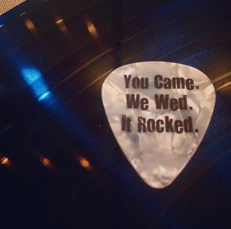 Rock n roll wedding guitar pick on record favors Wedding Ideas Rock And Roll, Rock Wedding Centerpieces, Love Rocks Wedding, Rock N Roll Wedding Cake, Rocker Wedding Theme, Rockstar Wedding Theme, Metal Themed Wedding, Rock Theme Wedding, Rock And Roll Wedding Theme