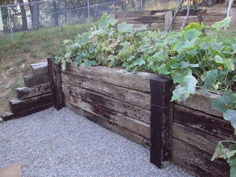 Railroad tie wall Railroad Ties Landscaping, Wooden Retaining Wall, Railroad Tie Retaining Wall, Sleeper Retaining Wall, Retaining Wall Construction, Sleepers In Garden, Backyard Wall, Building A Retaining Wall, Railroad Ties