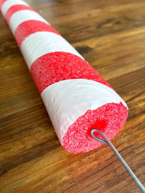 DIY Giant Candy Canes & Lollipops Christmas Decorations | eHow Diy Giant Candy, Candy Cane Lollipops, Giant Candy Cane, Candy Props, Christmas Candy Cane Decorations, Candy Decorations Diy, Giant Lollipops, Diy Christmas Candy, Candy Cane Decorations