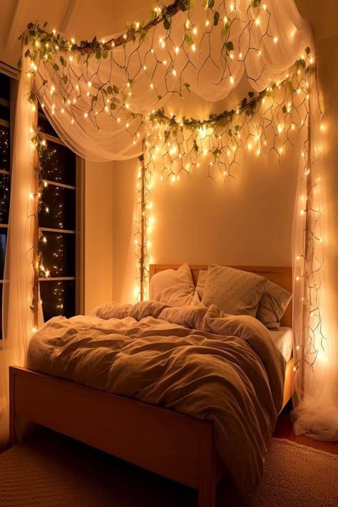 A cozy bedroom with a canopy of fairy lights and greenery, perfect for fall-inspired affordable bedroom decor. Fairy Light Canopy Bedroom, Fairy Cottage Room Ideas, Bed With A Canopy, Folklore Bedroom Ideas, Leafy Canopy Bed, Decorated Canopy Bed, Bed Fairy Lights, Fairy Canopy Bed, Cottage Core Canopy Bed