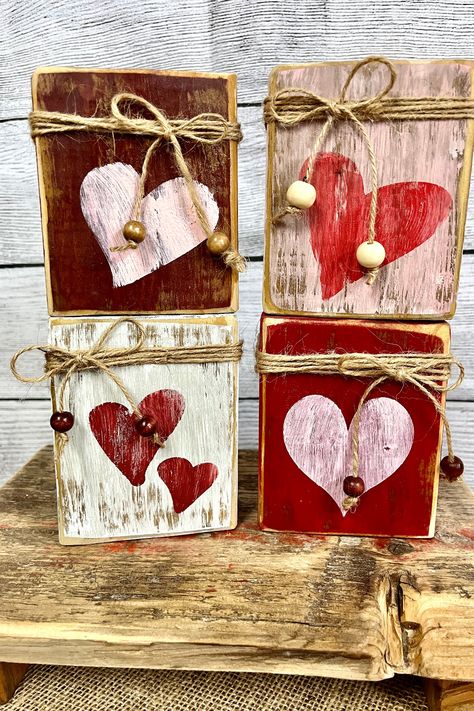 Elevate your rustic home decor game with our unique reclaimed wood primitive valentine blocks. Perfect as mantel decorations or tiered tray additions, these handcrafted masterpieces make for the ideal Valentine's Day gift. Click through to see how these beautiful blocks can transform your home! Wood Crafts For Valentines Day, Rustic Valentine Crafts, Valentines Day Wood Crafts, Valentine Blocks, Primitive Crafts Diy, Valentine Craft Decorations, Valentine Wood Crafts, Primitive Valentine, Saint Valentin Diy