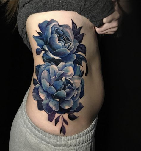 Blue Peonies Tattoo, Cover Up Color Tattoos, Blue And Purple Flower Tattoo, Flower Cover Up Tattoo Before And After, Blue Flower Tattoos For Women, Flower Tattoo Cover Up Ideas, Green Flower Tattoo, Dark Flower Tattoos, Blue Peony Tattoo