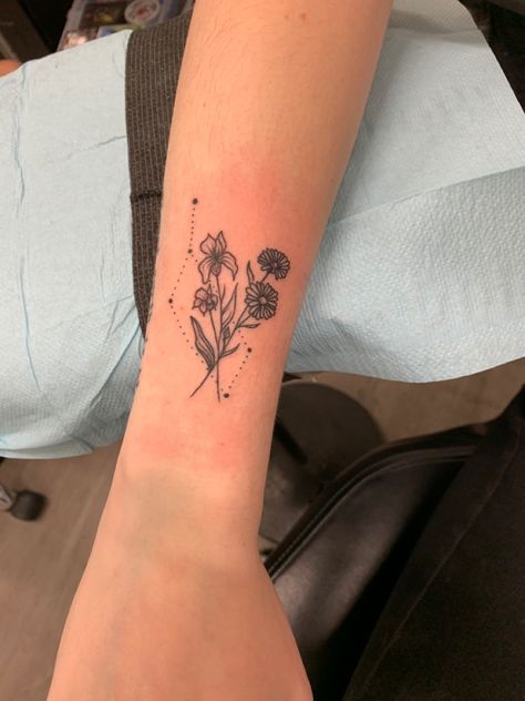 Floral tattoo constellation tattoo aster flower iris flower lyra constellation Aster And Iris Flower Tattoo, Lyra Constellation Tattoo, Lyra Tattoo, Aster Tattoo, Aster Flower Tattoos, Iris Flower Tattoo, Garter Tattoo, Iris Tattoo, Aster Flower