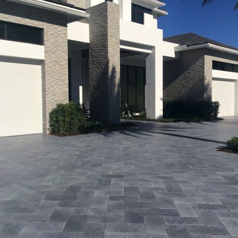 Unique Marble Pavers at Hardscape.com. Come visit our showroom in Boca Raton and see This beautiful Black Marble driveway. You will not find this material anywhere else in the whole country, quarried and processed by Hardscape.com. Call us today, we are here to assist you in your residential or commercial project! 1(888) 513-6374 or e-mail us at Sales@hardscape.com -Fast nationwide delivery- Request a pricing now. https://www.hardscape.com/request-an-estimate-now/ Front Garden Ideas Driveway, Cambridge Pavers, Garden Ideas Driveway, Large Pavers, Driveway Paving, Paver Stones, Paver Driveway, Travertine Stone, Driveway