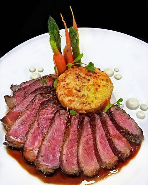 Seared NY Steak, Sweet Potato Gratin, Baby Carrots, Asparagus, Roquefort Cream, Brandy/Pan Sauce