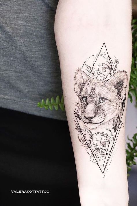 small-lion-cub-surrounded-by-flowers-geometrical-forearm-tattoo-lion-tattoos-for-females Lion Cub Tattoo, Cubs Tattoo, Lioness Tattoo, Animals Tattoo, Leo Tattoos, Strength Tattoo, Tattoo Girls, Tattoo Feminina, Tattoo Work