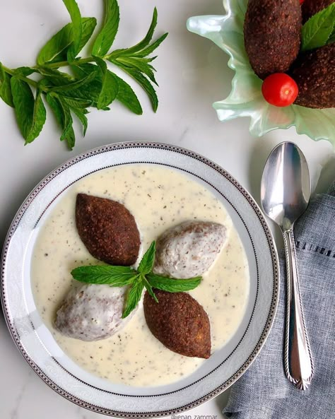 Jenan on Instagram: “Kibbeh bil laban is one my kids favourite meals. It’s a warm yogurt infused with garlic and mint with kibbeh footballs  I had some kibbeh…” Lebanese Dinner, Lebanese Breakfast, Wallpaper Muslim, Table Ramadan, Arabic Food Recipes, Breakfast Presentation, Food Turkish, Middle East Culture, Arab Food