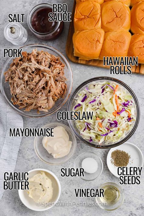 When you need a hot and hearty dish to satisfy a crowd, give these pulled pork sliders a try! Let a delicious pork roast cook for hours in a slow cooker with seasonings and cola. Once tender, shred the meat and mix it with barbecue sauce. Load up buttery, toasted Hawaiian rolls with the savory pork, and add tangy cole slaw and even cheddar cheese on top. Each bite bursts with a luscious mix of flavors! #pulledporksliders #pulledporkslidersrecipe #spendwithpennies #pulledporkslidershawaiianrolls Pulled Pork Sliders Hawaiian Rolls Coleslaw, Barbecue Pork Sliders, Pull Apart Hawaiian Roll Sliders, Pulled Pork Sliders With Slaw, Bbq Pork Sliders Hawaiian Rolls, Pulled Pork Hawaiian Rolls Sliders, Bbq Sliders Recipes Hawaiian Rolls, Pulled Pork Sliders Hawaiian Rolls, Pork Sliders Hawaiian Rolls