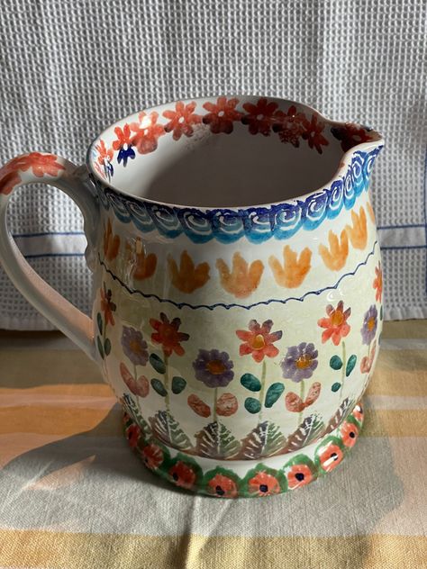 Rare Really nice Pottery hand painted pitcher made for Nordstrom. The colors are so pretty mix of blue, lavender, rust and greens. Pitcher measures 6.5 inches tall x 7.5 inches across including handle. No chips or cracks. In beautiful condition Painted Mugs Ceramic, Mug Pottery Painting Ideas, Painted Pottery Ideas, Painted Pottery Mug, Pottery Painting Mug, Ceramic Pottery Painting, 70s Pottery, Painted Ceramic Mug, Pottery Painting Ideas