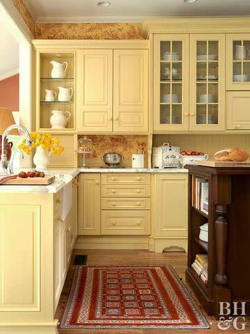 Kitchen With Yellow Accents, Light Yellow Kitchen, Red Floors, Yellow Kitchen Accents, Dark Wood Accents, Yellow Kitchen Walls, Yellow Kitchen Designs, Yellow Kitchen Cabinets, Kitchen Yellow