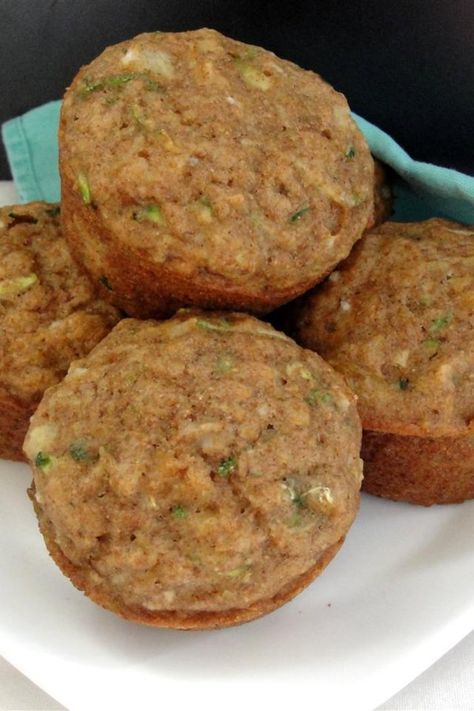 Pineapple Zucchini Muffins | "These are quickly a new favorite! This is not a heavy dense muffin, but rather light, delicate and moist. I used summer squash instead of zucchini. My very picky 6 year old took one bite and said "YUM!" What a nice way to get veggies in !" #allrecipes #summerrecipes #summerdishes #recipes #summerfood #summerrecipeideas Zucchini Oatmeal Muffins, Zucchini Pineapple, Zucchini Bread Muffins, Pineapple Muffins, Zucchini Oatmeal, Zucchini Muffin Recipes, Moist Muffins, Filled Muffins, Zucchini Muffins