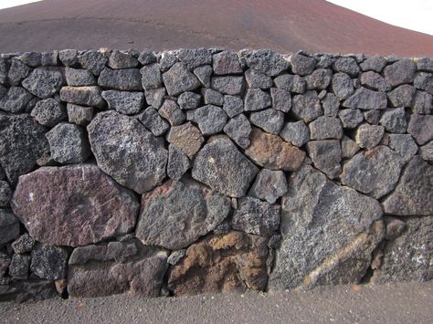 Volcanic rock Lanzarote Volcanic Rock Landscaping, Black Rock Backsplash, Lava Rock Wall, Volcanic Stone Wall, Volcano Rock, Rock Surface Texture, Volcanic Rock Texture, Rock Retaining Wall, Creative Walls