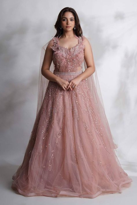 Pink net embroidered sequin one-shoulder embellished gown for bridal party Bandhej Print, Gown With Cape, Latest Bridal Lehenga Designs, Bridal Gown Inspiration, Net Gowns, Sangeet Outfit, Bridal Lehenga Designs, Latest Bridal Lehenga, Cape Gown