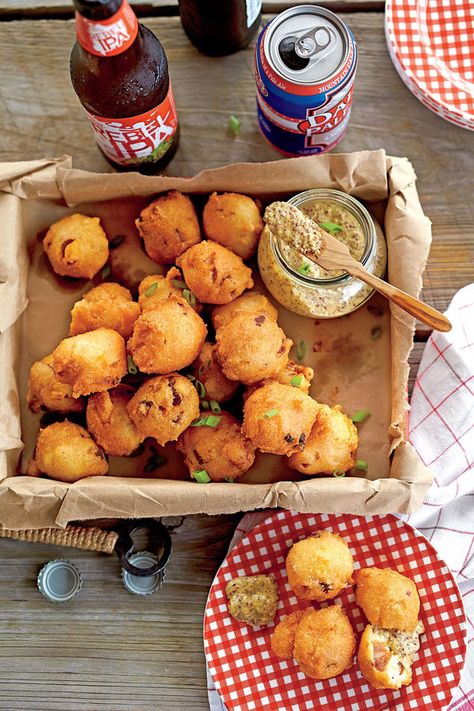 Crispy Andouille Hush Puppies - All-Time Favorite Fourth of July Snacks - Southernliving. Recipe: Crispy Andouille Hush Puppies  Spicy Andouille sausage adds a dose of Cajun flavor to traditional hush puppies. Shrimp Boil Party, Hush Puppies Recipe, Barbecue Sides, Barbecue Side Dishes, Oyster Roast, Southern Dishes, Simple Food, Andouille Sausage, Andouille