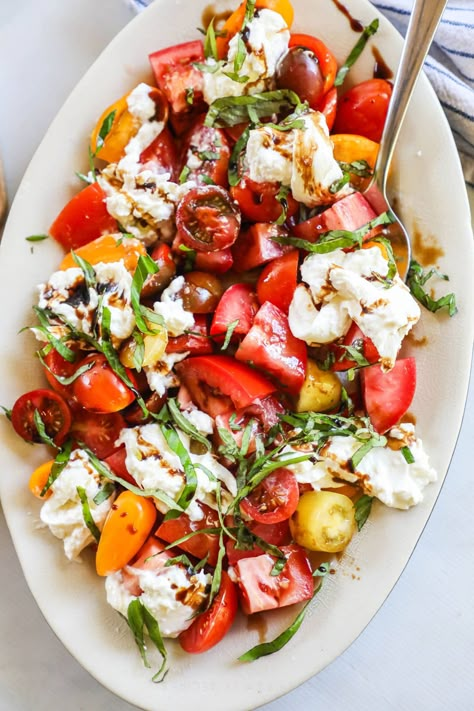 Burrata Caprese Salad · Easy Family Recipes Asparagus Tomato Salad With Burrata Cheese, Best Caprese Salad, Tomato And Basil Salad, Burrata Caprese Salad, Burrata Tomato, Tomato And Burrata, Burrata Caprese, Good Salads, Menu Presentation