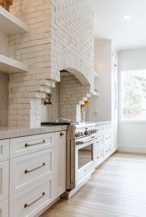 Winter Cliffs — The Idea Room Brick Stove Surround Kitchen Range Hoods, White Brick Range Hood, White Brick Mansion, Brick Oven Hood, Lime Wash Range Hood, Arched Oven Hood, Brick Hood Vent, Brick Stove Hood, Brick Vent Hood Kitchen