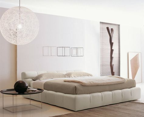 Tufty Bed-the existing tufty time collection has now been extended to the night time area, where ”chesterfield” style and “capitonnè” look are expressed in a more marked manner. The upholstery in leather or fabric is subdivided into large squares that are joined by pleats, perforated in the leather version. Closed at the bottom, the bed can accommodate a number of different wire meshes, including a hinged version which provides access to a useful utility compartment. From www.BeBItalia.it. Tufty Bed, Leather Upholstered Bed, Personalized Bedroom, Modern Design Trends, Modern Luxury Bedroom, Patricia Urquiola, Contemporary Bed, Furniture Bed, Modern Bedroom Design