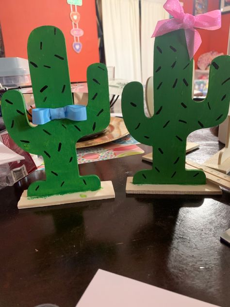 Wooden Cactus and ribbon for bows from dollar tree. Senor Or Senorita Gender Reveal, Señor Or Señorita Gender Reveal, Wooden Cactus, Western Party Decorations, Gender Reveal Decor, Cactus Diy, Western Party, Western Parties, Gender Reveal Decorations