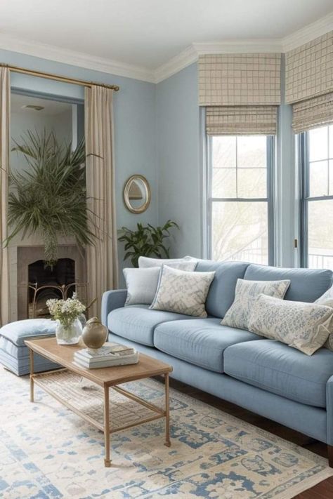 Powder Blue Couch Living Room, Dusty Blue Couch Living Room, Grey Blue Couch Living Room Ideas, Living Room Light Blue Couch, Living Room With Cream Couch, Warm Blue Living Room, Light Blue Living Room Color Scheme, Baby Blue Living Room, Blue Couch Living Room Colour Schemes