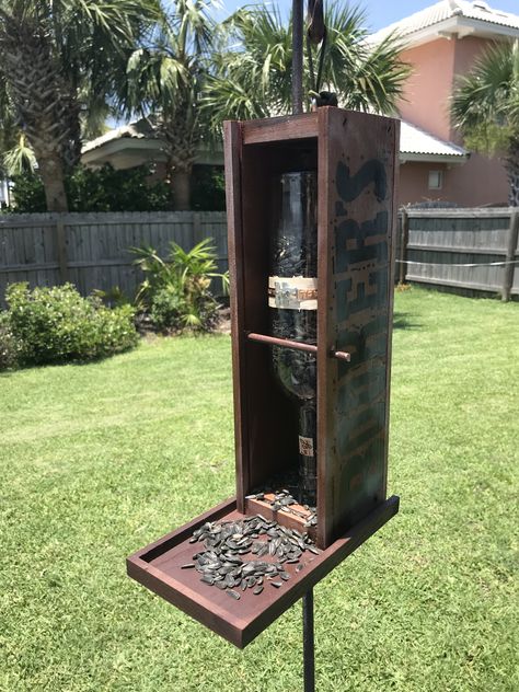 Bird feeder made from a Bookers bourbon box and Basil bourbon bottle. Bookers Bourbon Box Diy, Bourbon Bottle Crafts, Bookers Bourbon, Antique Bird Cages, Birdhouse Ideas, Bourbon Bottle, Box Crafts, House Crafts, Bird Cages