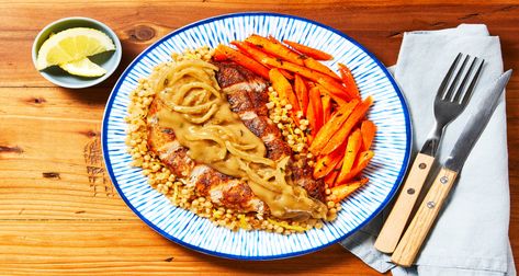 Gravy-Smothered Pork Chops Recipe | HelloFresh Copycat Hello Fresh, Potato And Black Bean Tacos, Smothered Pork Chops Recipe, Hello Fresh Meals, Sweet Potato And Black Bean, Seared Pork Chops, Smothered Pork, Honey Roasted Carrots, Black Bean Tacos