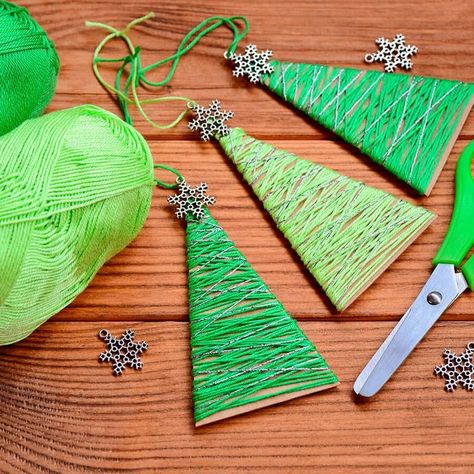 holiday activities Christmas crafts ideas cardboard trees Cheap Christmas Crafts, Cardboard Christmas Tree, Yarn Trees, Rustic Christmas Ornaments, Easy Christmas Ornaments, Fabric Christmas Ornaments Diy, Creative Christmas Trees, Christmas Craft Projects, Unique Christmas Ornaments