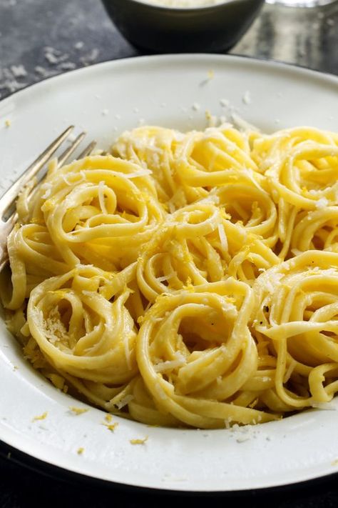 Linguine With Lemon Sauce | Pierre Franey, NYT Cooking ~ Very simple recipe. Boil 8 oz linguine & drain well. Melt 2 Tbsp butter in skillet & add 1 Tbsp grated lemon zest; cook briefly until fragant. Stir in ¼ cup heavy cream. Add pasta & 2 Tbsp fresh lemon juice & stir until heated through. Add 2 Tbsp good-quality grated Parmesan & toss. Serve with add'l Parmesan & lemon zest on the side. #spaghetti #fettucini Tomato Pasta Salad, Confort Food, Butter Pasta, Lemon Pasta, Nyt Cooking, Lemon Sauce, Think Food, Pizza Party, Linguine