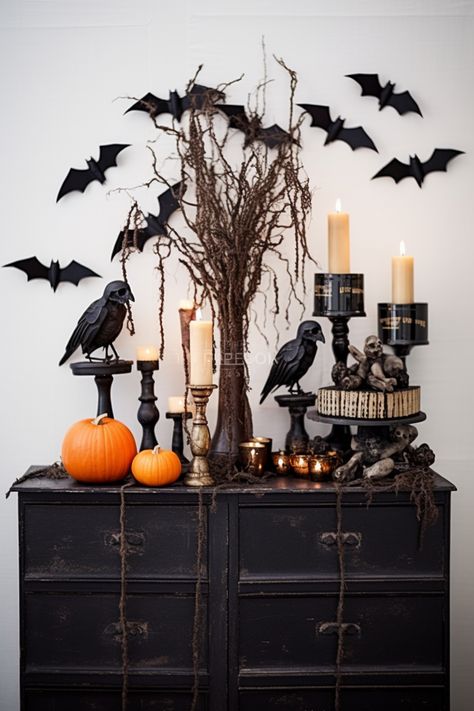 Transform your black dresser into a haunting centerpiece with candles, crows, and intricate costumes. Get inspired by this detailed, high-quality tabletop photography. #HalloweenDIY #YankeeCore Centerpiece With Candles, Tabletop Photography, Black Dresser, Halloween Tablescape, Halloween Party Dinner, Homemade Halloween Decorations, Halloween Room Decor, Halloween Spooktacular, Elegant Halloween