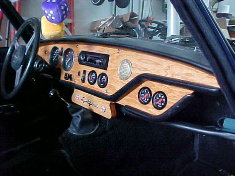 Spitfire diy wood and leather dash. Interior in this thing looks so much cooler than any new car! Simplicity and functionality beats plastic kitch. Even BMW can't resist using leather look plastic. Car Wood Interior, Triumph Spitfire Interior, Wooden Dashboard Cars, Retro Car Dashboard, 1965 Vw Beetle Interior, Brown Leather Interior Car, Welcome Post, Wood Car, Car Interior Upholstery