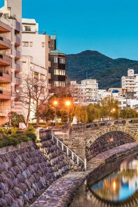 The ultimate guide to Nagasaki, full of the best things to do in Nagasaki in two days. From must-see attractions to where to enjoy the city's famous cuisine. Nagasaki Japan, Arch Bridge, Stone Arch, Nagasaki, Old Bridge, National Treasure, Chinese Architecture, Travel Board, Old Stone