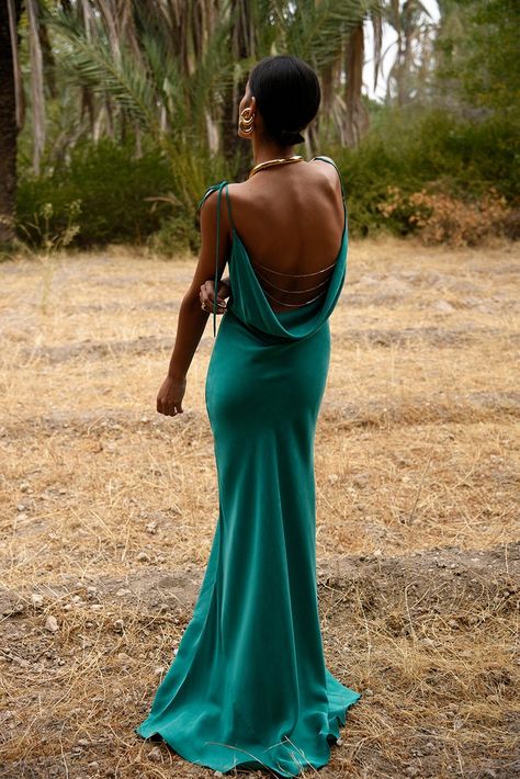 Make a statement in the captivating Seraphina. Sleek emerald satin twists into a V-neck, elegant cutaways highlight your waist, the gentle A-line silhouette glides to the floor. Wear with undone hair and minimal accessories, perfectly balancing polished with sensual. Ophelia Dress, A Rat, Elegant Party Dresses, Maxi Slip Dress, Satin Maxi, Satin Maxi Dress, Elegant Party, Boho Maxi Dress, Odessa