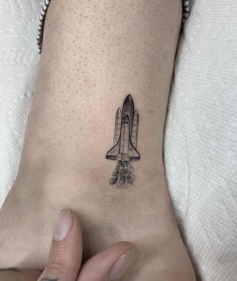 Rocket by Romeo Lacoste (@romeolacoste) from Los Angeles, USA, CA #usatattoo #tattoousa #minimalismtatto #latattoo #losangelestattoo #minitattoo Space Shuttle Tattoo, Skyline Tattoo, Compass Rose Tattoo, Coordinates Tattoo, Astronaut Tattoo, Usa Tattoo, La Tattoo, Single Needle Tattoo, Map Tattoos