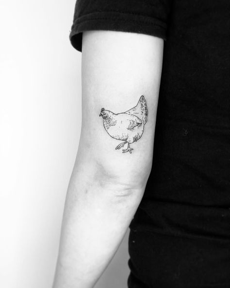 Small chicken tattoo by Jake Harry Ditchfield - Tattoogrid.net Chicken Tattoo For Men, Chicken Minimalist Tattoo, Simple Chicken Tattoos For Women, Small Chicken Tattoo Simple, Chicken Tattoo Ideas Simple, Fine Line Chicken Tattoo, Tiny Chicken Tattoo, Simple Chicken Tattoo, Chicken Tattoos For Women