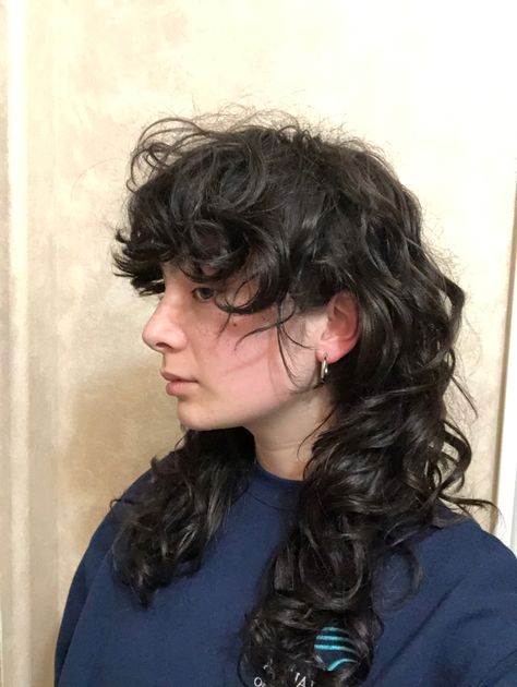 medium length wavy hair, mullet or shag style haircut Curly Shag Wolfcut Haircut, Shullet Hairstyles Long Curly, Mullet Hairstyle Wavy Hair, Shag Mullet Curly Hair Long, Long Shaggy Mullet Curly Hair, Long Curly Shag Mullet, Rock Haircuts For Women, Shaggy Mullet Wavy Hair, Curly Hair Mullet Long