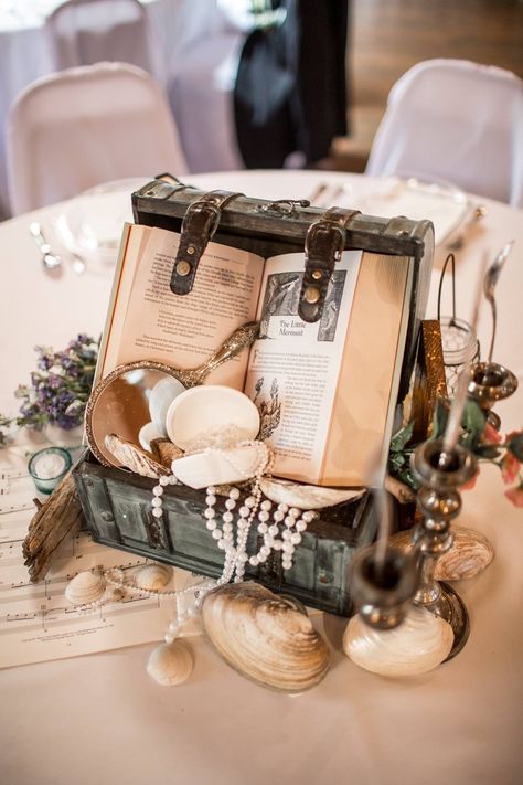 Little Mermaid Centerpiece- Fairytale Wedding (📸 jonathanterhaarphotography) Once Upon A Time Table Centerpieces, Mermaid Wedding Centerpieces, Shipwreck Wedding Theme, Quinceanera Themes Unique, Disney Sweetheart Table Wedding, 1700 Wedding Theme, Pirate Theme Quinceanera, Pirate Themed Wedding Decor, Little Mermaid Table Centerpieces