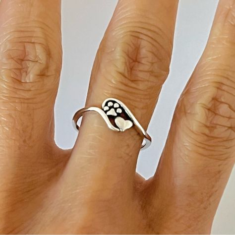 925 Sterling Silver Height: 8mm Symbolizes: Love, Pets, Animals, And Compassion Cartier Love Band, Cat Rings, James Allen Rings, Fork Ring, Michael Kors Ring, Paw Jewelry, Dog Lover Jewelry, Paw Ring, Rock Rings