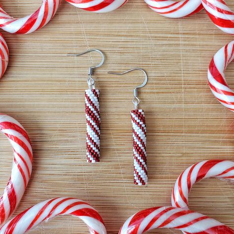 These are part of the Holiday Collection palette using white and red to create  the look of a peppermint stick. These beaded beauties are handmade with love and size 15/0 glass seed beads woven by hand one bead at a time. They measure approximately 2" long (from the top of the ear wire) and .25" wide. They are extremely lightweight and should not pull on your ear as you wear them. This is currently a Made to Order item and may take up to 2 weeks to create before shipping. I will send a message w