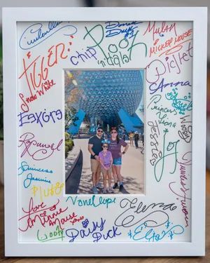 Disney souvenirs you’ll remember for years, without costing a fortune Disney Picture Frames, Signature Picture Frame, Disney World Souvenirs, Disney Signatures, Disney Autograph, Disney Frames, Best Souvenirs, Disney Souvenirs, Lego Store