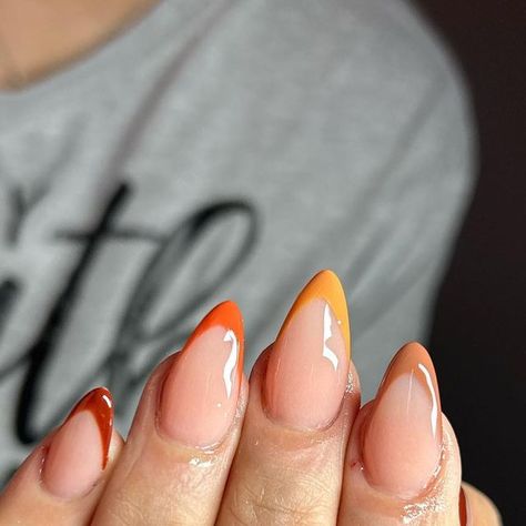 Ashley Lebrón on Instagram: "Fall almond frenchies 🍂🍁 . .using @beetlesgelpolish Fall Harvest collection @beetles_community  . #nofilterjustsazon #acrylicnails #nails #nailsarelife #nailporn #nailsoftheday #explore #explorepage #chicagonails #momnailtech #chicagonailtech #latinanails #puertoricannailtech #fallnails #frenchtipnails #nudenails" Short Almond Nails Thanksgiving, Short Almond Thanksgiving Nails, Fall Colored French Tip Nails, French Tip Nails Fall Colors, Thanksgiving Nails French Tip, Fall Tips Nails, Fall Oval Nails, Almond Frenchies, Burnt Orange Fall Nails