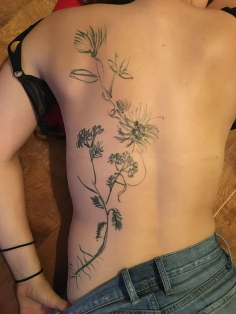 Definitely much Smaller/narrower/more detailed than this and over to left side of body more (with yarrow root starting on left side. following waistline as it curves towards the back, curving from left side body up to back of shoulder?), but about this length (height of top flower on shoulder)/general shape/concept I like. Left Side Back Tattoo, Upside Down Flower Tattoo, Plant Tattoo Back, Vertical Flower Tattoo, Side Body Tattoos For Women, Side Torso Tattoo, Vertical Back Tattoo, Symmetrical Shoulder Tattoo, Side Body Tattoos