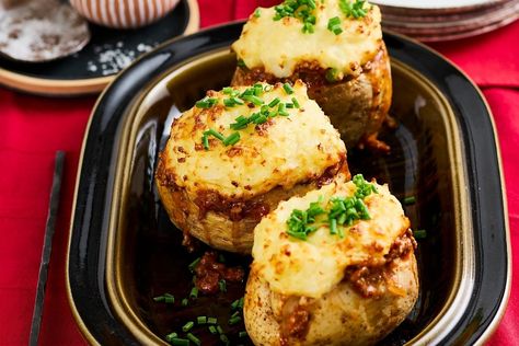 Cottage pie jacket potatoes Recipe | Better Homes and Gardens Cottage Pie Jacket Potato, Cottage Pie Potatoes, Cottage Pie Baked Potatoes, Jacket Potato Recipe, Stuffed Recipes, Mince Dishes, Lotr Party, Veggie Bake, Pie Ideas