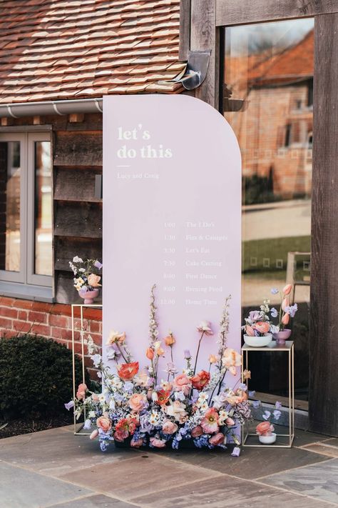 Lilac wedding sign with peach garden roses, white peonies, lilac sweet peas, bluebells and wildflowers floral arrangements | Suzy Elizabeth Photography Pastel Wedding Theme, Peach Garden, Peach Wedding Flowers, Lilac Wedding, Roses White, Geometric Wedding, Rock My Wedding, 캐릭터 드로잉, Garden Party Wedding