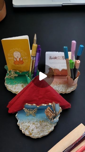 Soul Kanvas (SK) | Resin Artist on Instagram: "Dive into the beauty of functionality with our latest creation! ✨ Imagine a stunning card and pen holder 🖋️that effortlessly transitions into a stylish tissue and toothpick holder stand. It’s more than decor, it’s a multifunctioneel masterpiece designed to elevate every corner of your space Need an organised desk? Check✅ Want a unique addition to your dining set-up? Check ✅ DM to know more about this product!!!! [resin art, functional art, tissue holder, card holder, resin holder, handmade gifts, unique gift ideas, small business india] #resinart #resinholder #cardholder #tissueholder #functionalart #homedecor #giftideas #handmadegifts #resintissueholder #resinplatter #resingifts #packagingideas #smallbusinessindia #resinpreservation" Resin Pen Holder, Resin Card Holder, Organised Desk, Abstract Art Projects, Tissue Paper Holder, How To Make Resin, Resin Artist, Office Room Decor, Art To Make